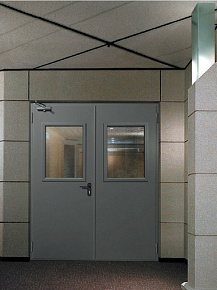 Двери тамбурные противопожарные утепленные со стеклом